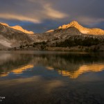 Sunrise illuminates North Peak. I like the rippled reflection, preserved by a fast shutter speed (1/90th sec)