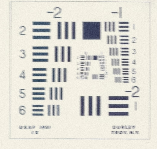 A 100% (1:1) view of a lens test chart taken with with a Canon 70-200 f/4L zoom at 200mm in a vertical orientation at 1/60th sec., f/5.6, 1000 ISO. This image, made without the battery grip, clearly shows the shutter shake.