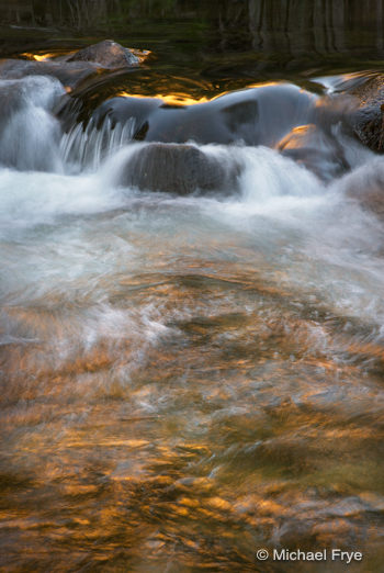 Golden reflections in the Merced River