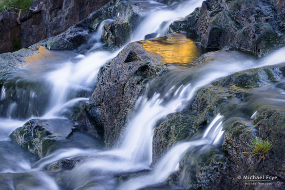 Small waterfall and reflections