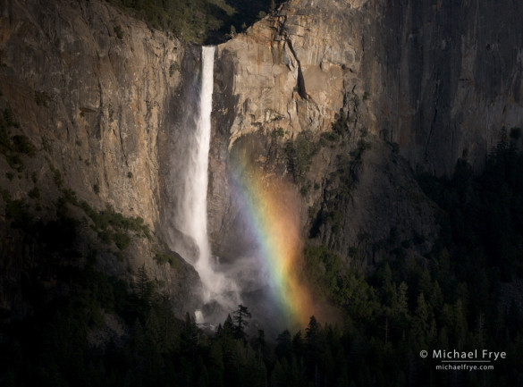 Bridalveil Fall and rainbow, Yosemite. Sun breaking through clouds created occasional spots of sunlight on the waterfall. I waited and hoped for a moment like this, when the sun spotlit the waterfall created natural vignetting.