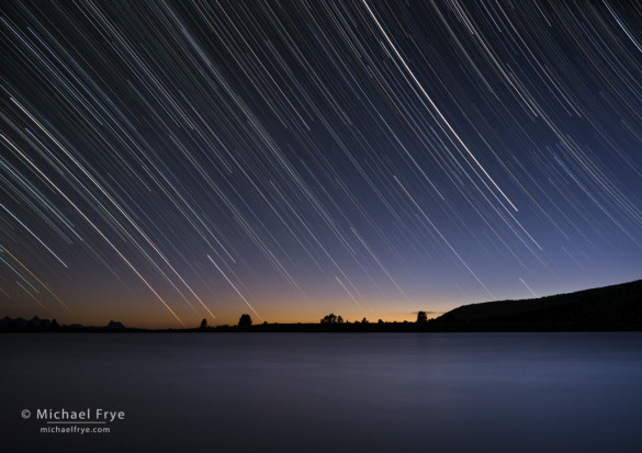 Star trails over an alpine lake, Yosemite NP, CA, USA