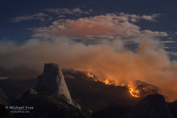 Meadow Fire burning next to Half Dome at night, Yosemite NP, CA, USA; 9-7-14