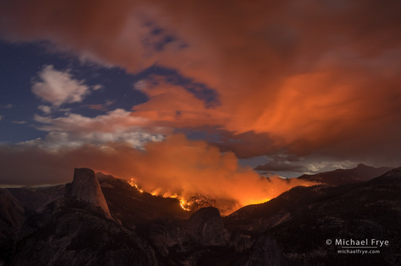 Meadow Fire burning in Little Yosemite Valley at night, with Half Dome on the left, Yosemite NP, CA, USA; 9-7-14