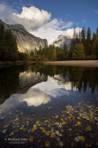 Half Dome and clouds reflected in the Merced River, autumn, Yosemite NP, CA, USA