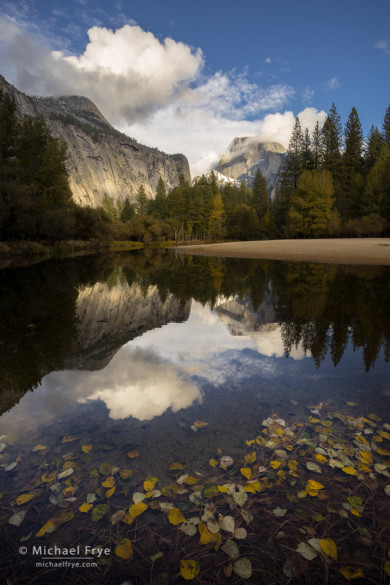 Half Dome and clouds reflected in the Merced River, autumn, Yosemite NP, CA, USA