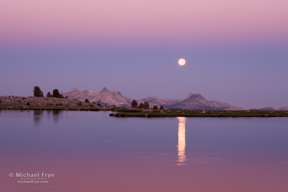 Full moon setting over Middle Gaylor Lake at dawn, Yosemite NP, CA, USA