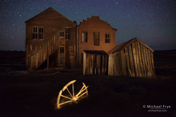 Wagon wheel behind the Dechambeau Hotel, Bodie State Historic Park, CA, USA