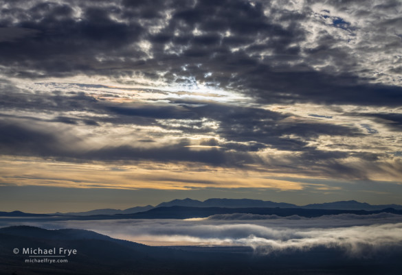 Fog and clouds over Mono Lake with the White Mountains in the distance, CA, USA