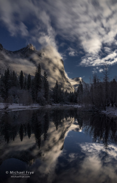 Three Brothers by moonlight during a clearing snowstorm, Yosemite NP, CA, USA