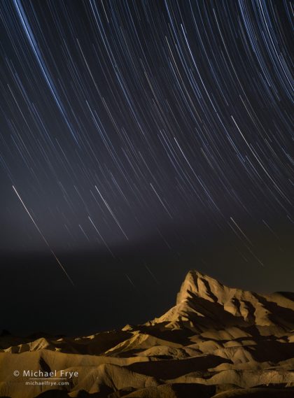 Star trails over Manly Beacon, Death Valley NP, CA, USA