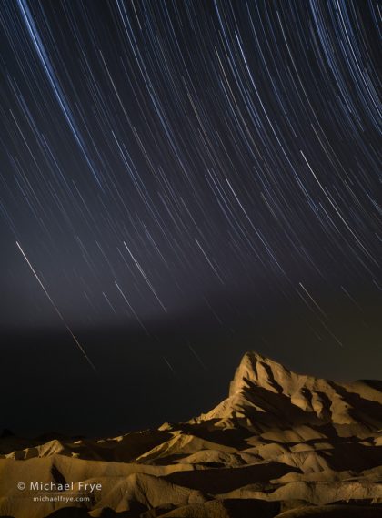 Star trails over Manly Beacon, Death Valley NP, CA, USA