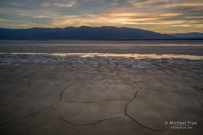 Water, mud, mountains, and sky, Death Valley NP, CA, USA