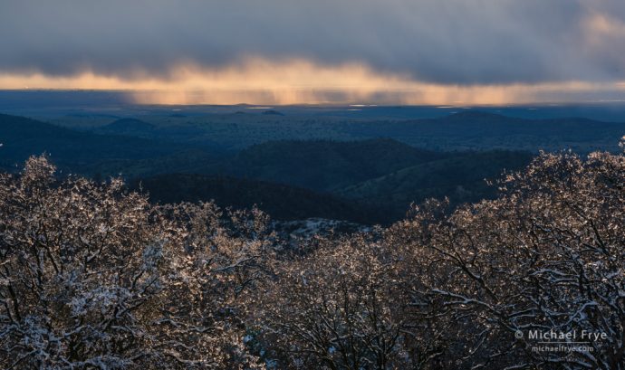 Rain squall over the Central Valley from the Sierra foothills, Mariposa County, CA, USA