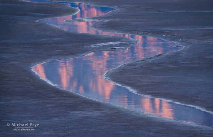 Stream rivulet in salt flats, Death Valley NP, CA, USA