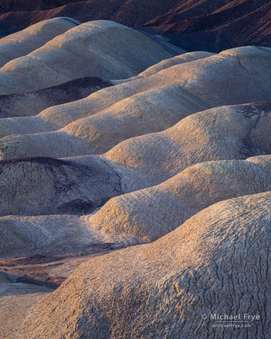 Badland formations, in late-afternoon light, Death Valley NP, CA, USA