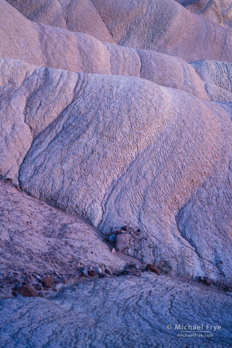 Badland formations at sunset, Death Valley NP, CA, USA