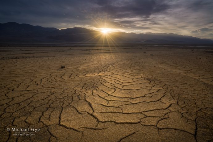 Mud cracks and setting sun, Death Valley NP, CA, USA