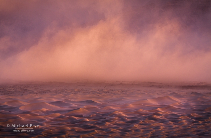 Dunes and blowing sand, sunrise, Death Valley NP, CA, USA