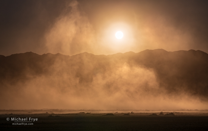 Dust storm, setting sun, Death Valley NP, CA, USA