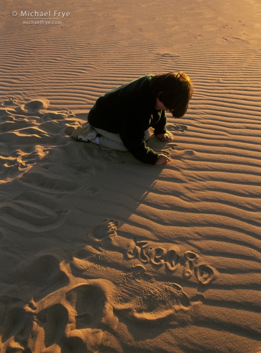 Kevin drawing in sand, Algodones Dunes, CA, USA