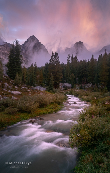 Mist, peaks, and creek at sunset, Sierra Nevada, CA, USA