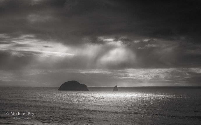 Sunlight and storm clouds, Oregon coast, USA