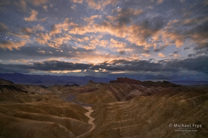 Clouds lit by the setting moon, Death Valley NP, CA, USA