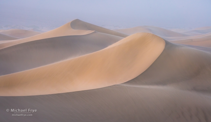 Dunes at sunrise in a sandstorm, Death Valley NP, CA, USA