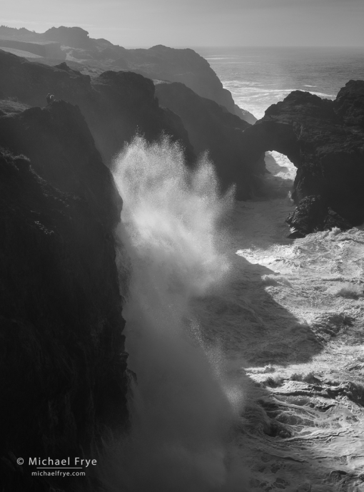 Wave splash and natural bridge, Oregon Coast, USA