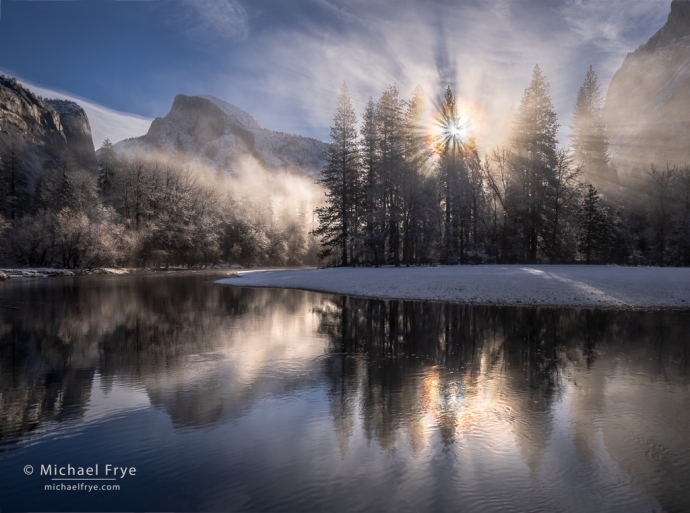 Half Dome and sunbeams, winter sunrise, Yosemite NP, CA, USA