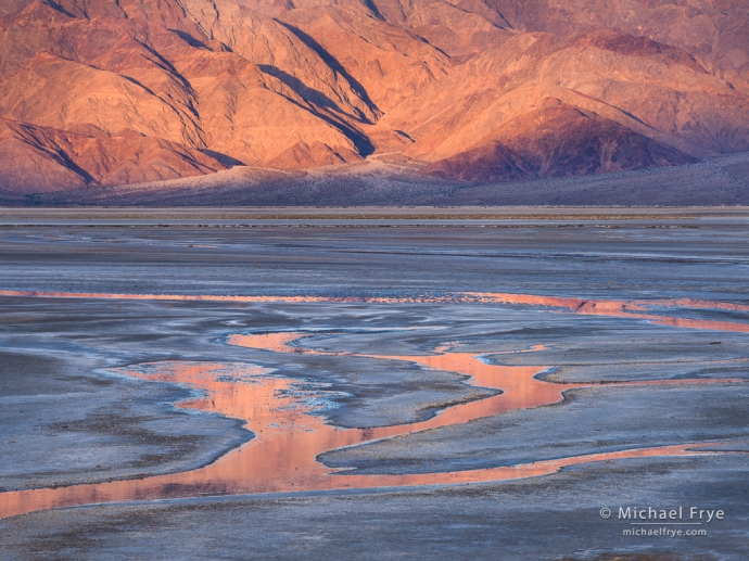 Mountains, salt flats, and stream rivulets, Death Valley NP, CA, USA
