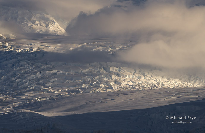Glacier with crevasses and clouds, Antarctica