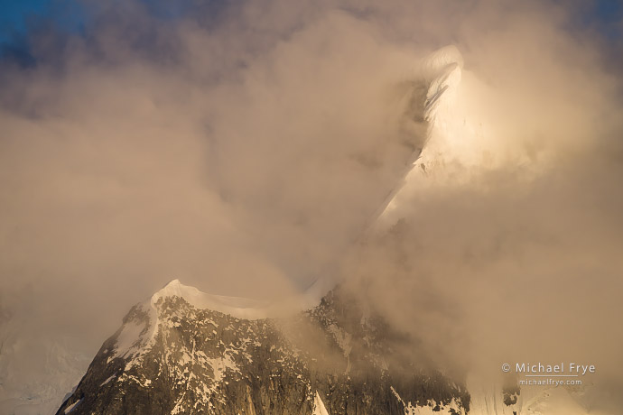 Clouds and snowy ridge, Antarctica