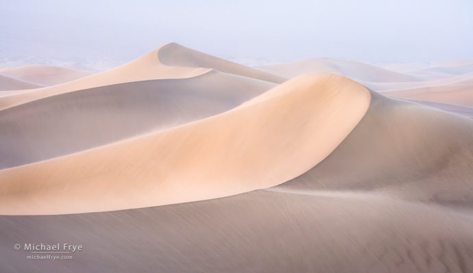 Dunes at sunrise in a sandstorm, Death Valley NP, CA, USA