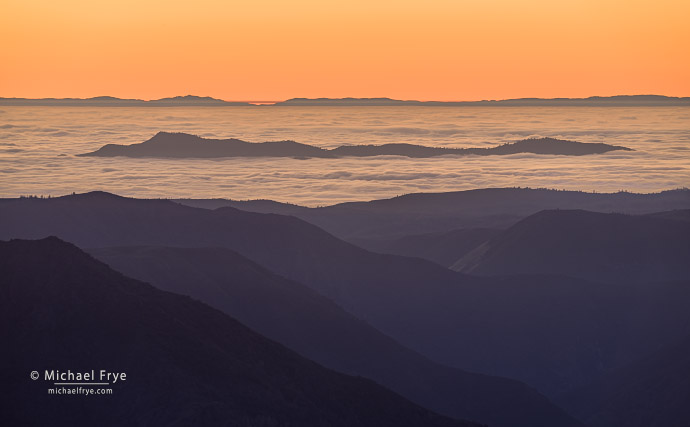 Sunset with fog over the San Joaquin Valley, from the Sierra Nevada foothills, CA, USA