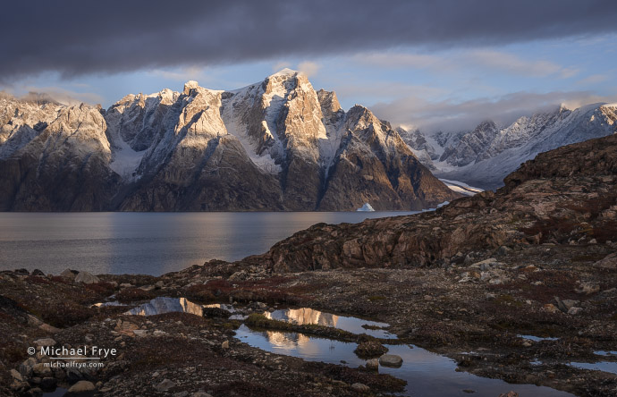 24. Pond, peaks, fiord, and glacier at sunrise, Scoresby Sund, Greenland