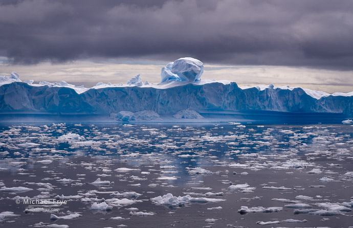 Ice boulder, clouds, and brash ice, Antarctica