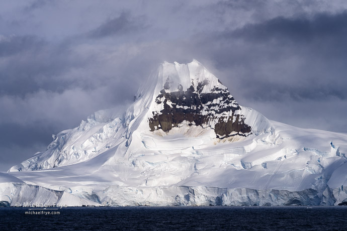 Peak, glacier, and clouds, Antarctica