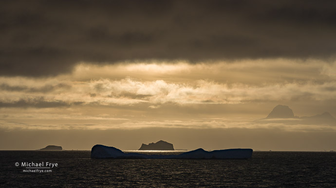 Icebergs and mountains at sunset, Antarctica
