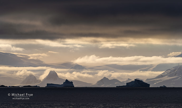 Mountains, clouds, and icebergs, Antarctica