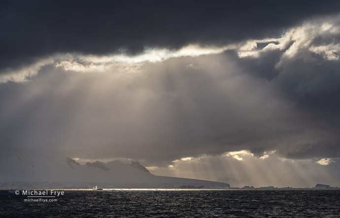 Clouds, sunbeams, and whale spouts, Antarctica